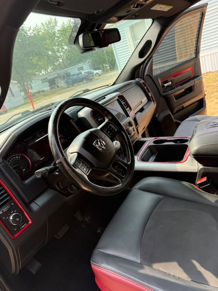 Detailed Dodge Ram interior with red accent trim