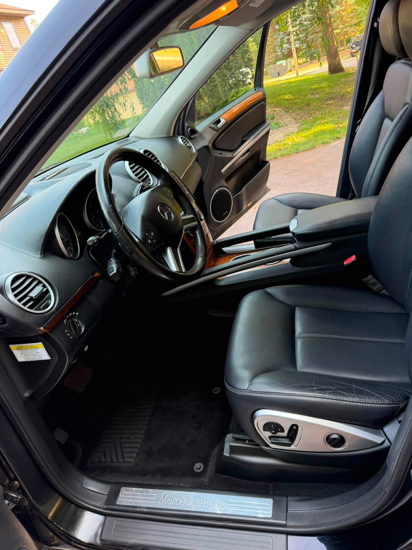 Spotless black leather Mercedes interior after full detail