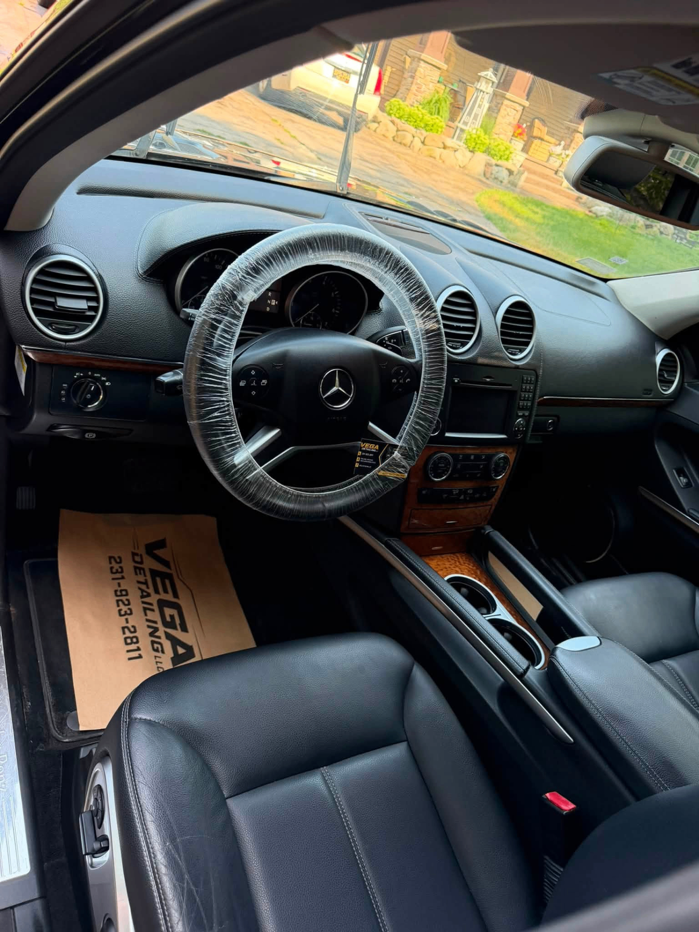 Mercedes interior detailed with branded Vega Detailing floor mat